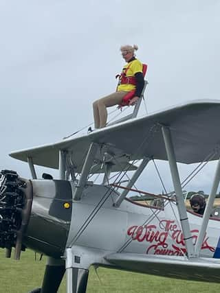 Doreen Buzzard wingwalking for LIVES.