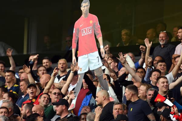Manchester United hope Cristiano Ronaldo, confirmed as a new signing on deadline day, will be more effective than the version in the crowd at Molineux last weekend.