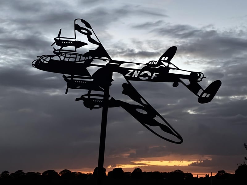 The Lancaster silhouette was created by Tambrath Welding, of Gosberton. Flt Sgt Copley said: "I came across their work online and noticed they had produced a Lancaster design. I contacted them to ask whether they could customise it to carry the markings of R5683 (ZN-F) as I thought it would be great to put it on the seabank during the service. They were only too happy to help and said they felt honoured to have been asked. They did a fantastic job, going above and beyond to ensure it was ready in time for the ceremony. As an incredibly thoughtful gesture, they generously donated seven individually welded metal poppies, one to accompany each lantern at the memorial. Their craftsmanship, generosity and genuine enthusiasm were outstanding."