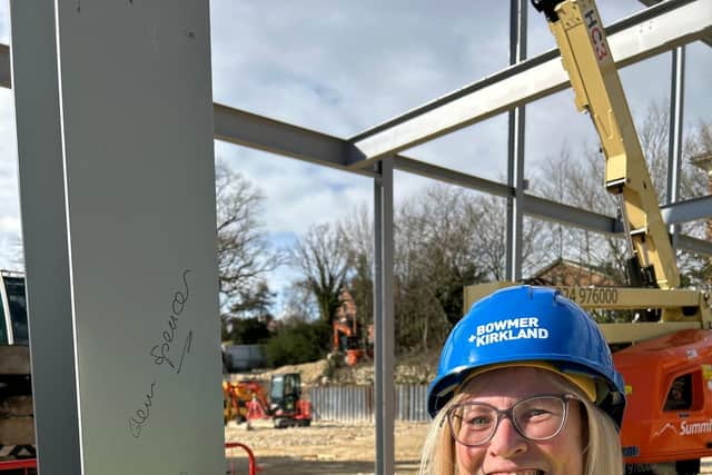 Teri signing the steel