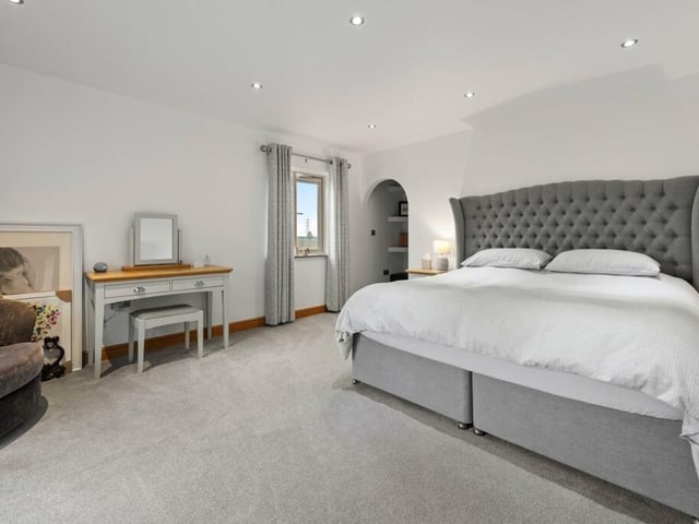 The principal bedroom and ...