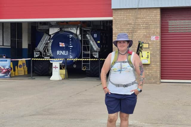 Carolyn outside Skegness Lifeboat Station after completing the 28-mile charity walk.