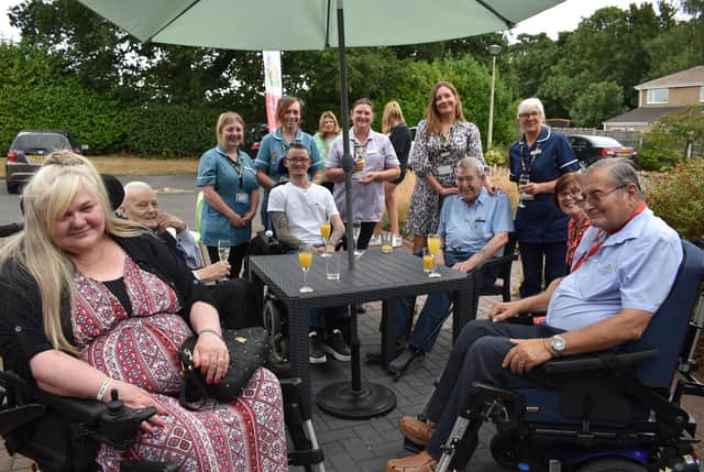 Lindsey Lodge patients and staff are pictured at The Butterfly Wing opening