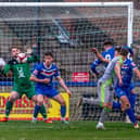 Ashley Jackson heads home Saturday's winner at Whitby. Photo by Brian Murfield.