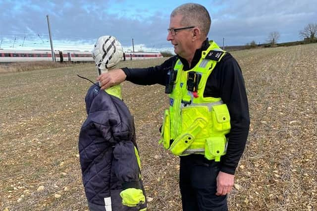 SC Abbott with the scarecrow.