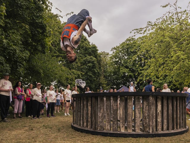 Backflipping tricks from The Giant Wheel finale outside The Hub. Photo: Scott Salt