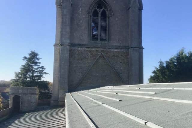 The temporary roofing on Threekingham Church after the lead theft.