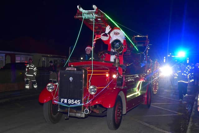 Santa on his vintage fire engine during Louth Fire Station Santa Run. Photos: D.R.Dawson Photography