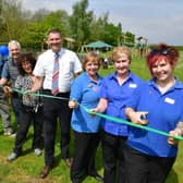 From left - David Nelson - chairman of playing field committee, Philip Baumber - chairman of PC, Rosa Nelson - playing field committee member, Juergen Schaper - general manager of Lincolnshire EFW, Christine Doughty, Mary Thorpe, Kelly Doughty - Metheringham co-op