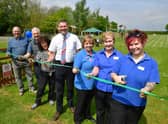 From left - David Nelson - chairman of playing field committee, Philip Baumber - chairman of PC, Rosa Nelson - playing field committee member, Juergen Schaper - general manager of Lincolnshire EFW, Christine Doughty, Mary Thorpe, Kelly Doughty - Metheringham co-op