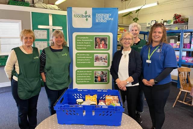 Coop food store staff visit Grantham Food Bank.