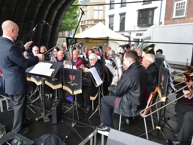 Kirton Brass Band performing on stage at the Jubilee Party in the Park in Boston.