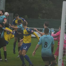 Goalmouth action in the gloom as Trinity win at Warrington. Photo by Jordan Vaughan.