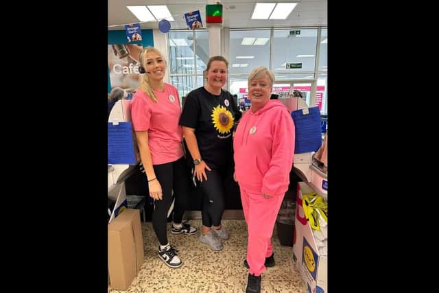 Tesco colleagues holding a fundraiser in aid of Ella.