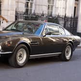 Library image of an Aston Martin V8 Vantage outside Christie's auction house in central London for the Sixty Years of James Bond auction.
