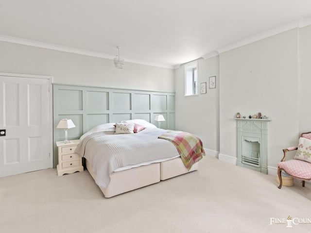 One of the five bedrooms.