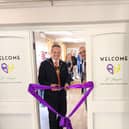 Mayor Darren Hobson cuts the ribbon