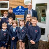 Kirkby-on-Bain primary school headteacher Georgina Day and chair of governors Paul Brewster with pupils.
