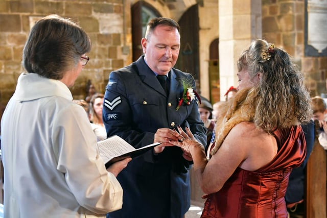 The exchange of rings during the ceremony.