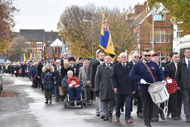 Skegness Remembrance Parade heads to the memorial at St Matthew's Church. Photo: Barry Robinson