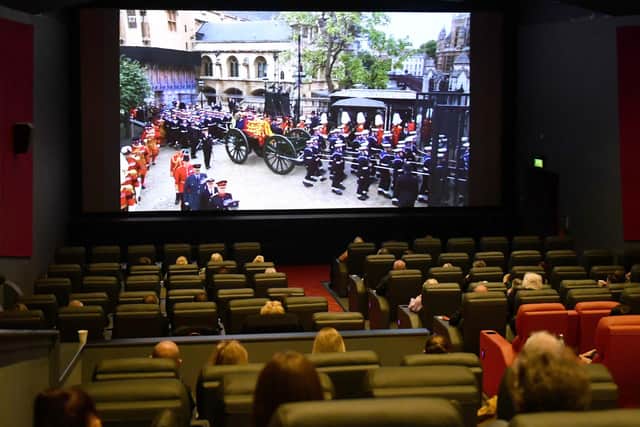 A screening of HM the Queen's funeral at Savoy Cinema, in Boston.
