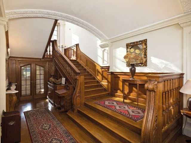 The stairs off the hall.