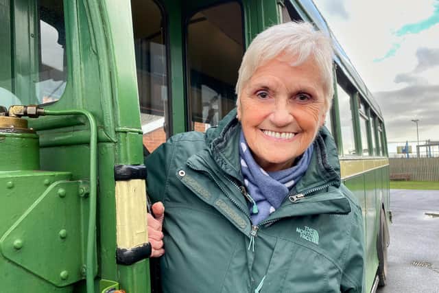 Former bus conductor Cath Hitchen on the Roadcar Leyland Tiger bus.