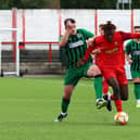 Action from Sleaford's (in red) trip to face Belper on Saturday. Photo: Steve W Davies Photography.