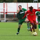 Action from Sleaford's (in red) trip to face Belper on Saturday. Photo: Steve W Davies Photography.