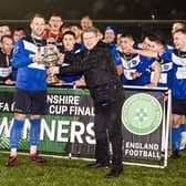 Boston Town lift the Lincs Senior Trophy. Pic Steve W Davies Photography.