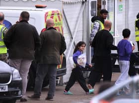 Detainees are seen inside the Manston holding centre for asylum seekers. Immigration minister Robert Jenrick this week vowed "more radical" policies to counter illegal migration.