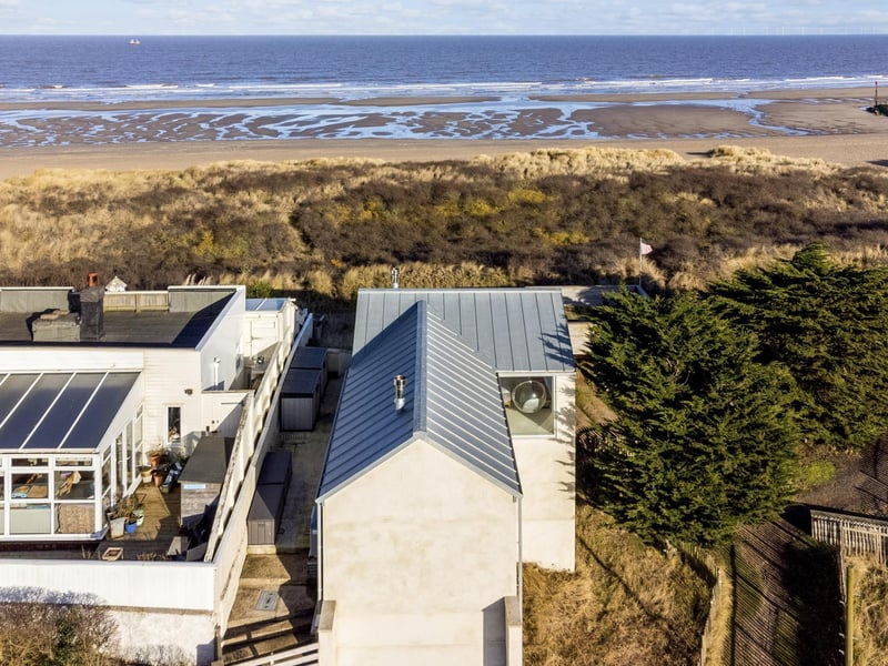 An aerial view showing how close the home is to the beach.