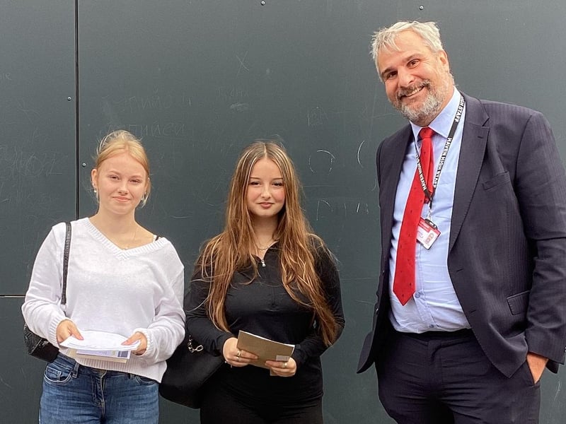 Vakare Mazeikaite, Steluta-Florentina Cracana, and Austin Sheppard, executive headteacher.