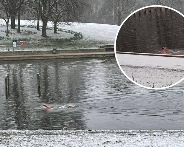 A man was caught on video swimming in Roundhay Park's Waterloo Lake in Leeds during freezing temperatures and warnings in place for snow.