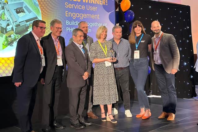 Sarah Cox from LPFT receiving the Best Service User Engagement Award at the Design in Mental Health Awards