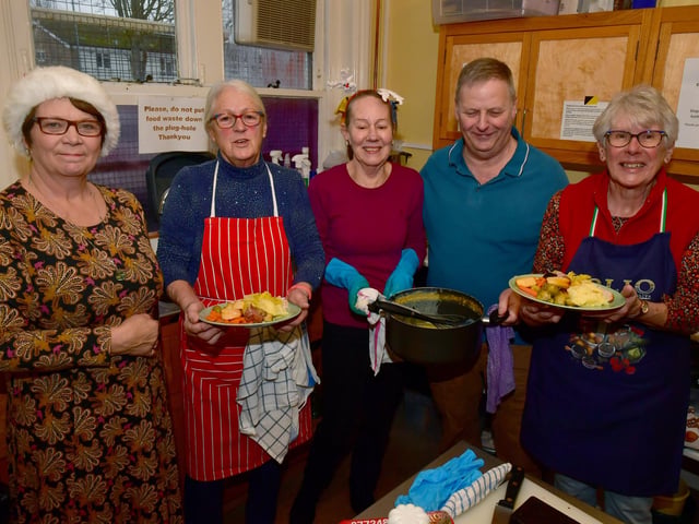 Volunteers at Wainfleet Christmas Community Meal (from left) County Councillor Wendy Bowkett, Sarah Scupholm, Leone Harding, Phil Lewis and Jan Ward