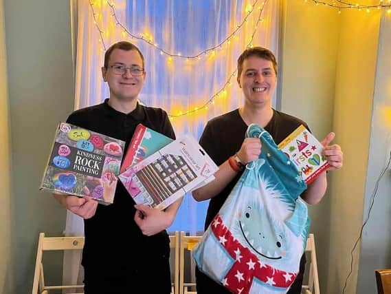 Tom Sanders and Ben Smith of the Neighbour's Kitchen appealing for Christmas gifts.