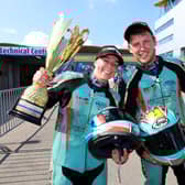 Emmanuelle Clement and Todd Ellis celebrate victory in Holland. Photo: Wally Walters.