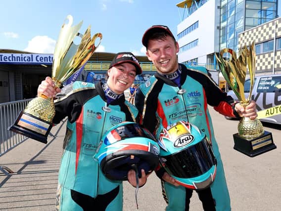 Emmanuelle Clement and Todd Ellis celebrate victory in Holland. Photo: Wally Walters.