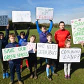 Youngsters and James Timson (centre) protest at Louth's  Wood Lane playing field.