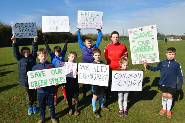 Youngsters and James Timson (centre) protest at Louth's  Wood Lane playing field.