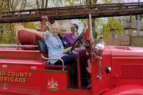 Sandra Lewis, Majella Wright and Dr Kat Collet in a fire truck