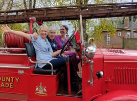 Sandra Lewis, Majella Wright and Dr Kat Collet in a fire truck