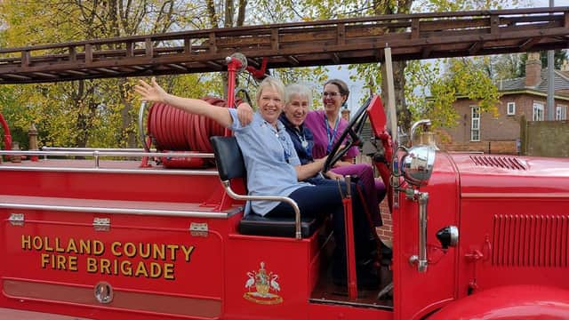 Sandra Lewis, Majella Wright and Dr Kat Collet in a fire truck
