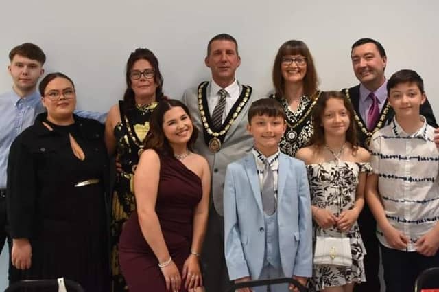 New Mayor of Skegness Coun Adrian Findley (back row centre), Mayoress Coun Sarah Staples (left), Deputy Mayor Coun Jimmy Brookes and Mayoress Emma Brookes with their families.