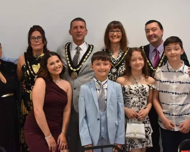 New Mayor of Skegness Coun Adrian Findley (back row centre), Mayoress Coun Sarah Staples (left), Deputy Mayor Coun Jimmy Brookes and Mayoress Emma Brookes with their families.
