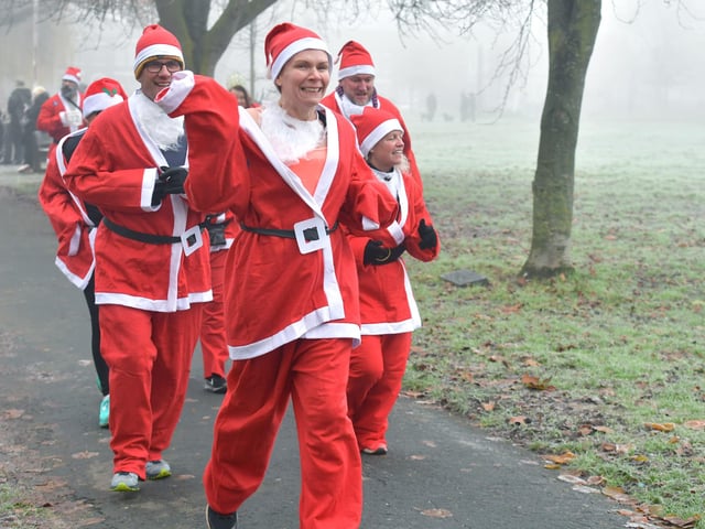 Action from this year's Boston Santa Run.