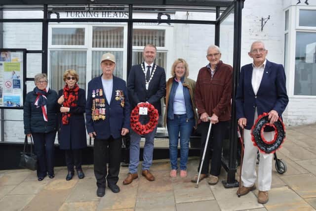 VE Day commemorations in Caistor with members of the town council. Left to right: Lynn Martin, Gill Somerscales, Victor Brocklesby, Mayor Jon Wright, Coun Jayne Bowman, David King, Lewis King (Head of British Legion). Photo David Siddall