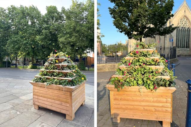 Two of the eight planters on display again in Boston town centre.