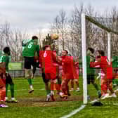 Sebastian Robbemond heads home the opening goal against Heanor. Photo: Steve W Davies Photography.